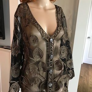 New with tags. Stunning First Choice jacket. Received as a gift.. never wore.